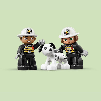 LEGO DUPLO fire station set featuring two firefighters and a playful dog, perfect for imaginative play.