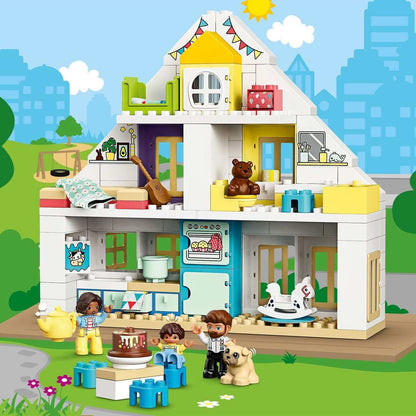 Colorful LEGO® DUPLO Town Modular Playhouse set with children playing and a dog, featuring 3 buildable houses for imaginative fun.