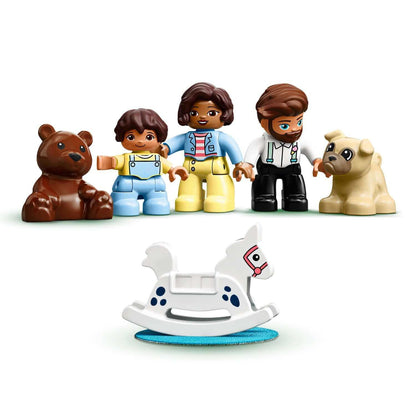 LEGO® DUPLO Town playset featuring three characters, a bear, a dog, and a rocking horse for imaginative play.