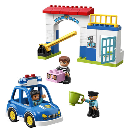 LEGO DUPLO Town Police Station 10902 set with police car, figures, and working gates for preschool fun.