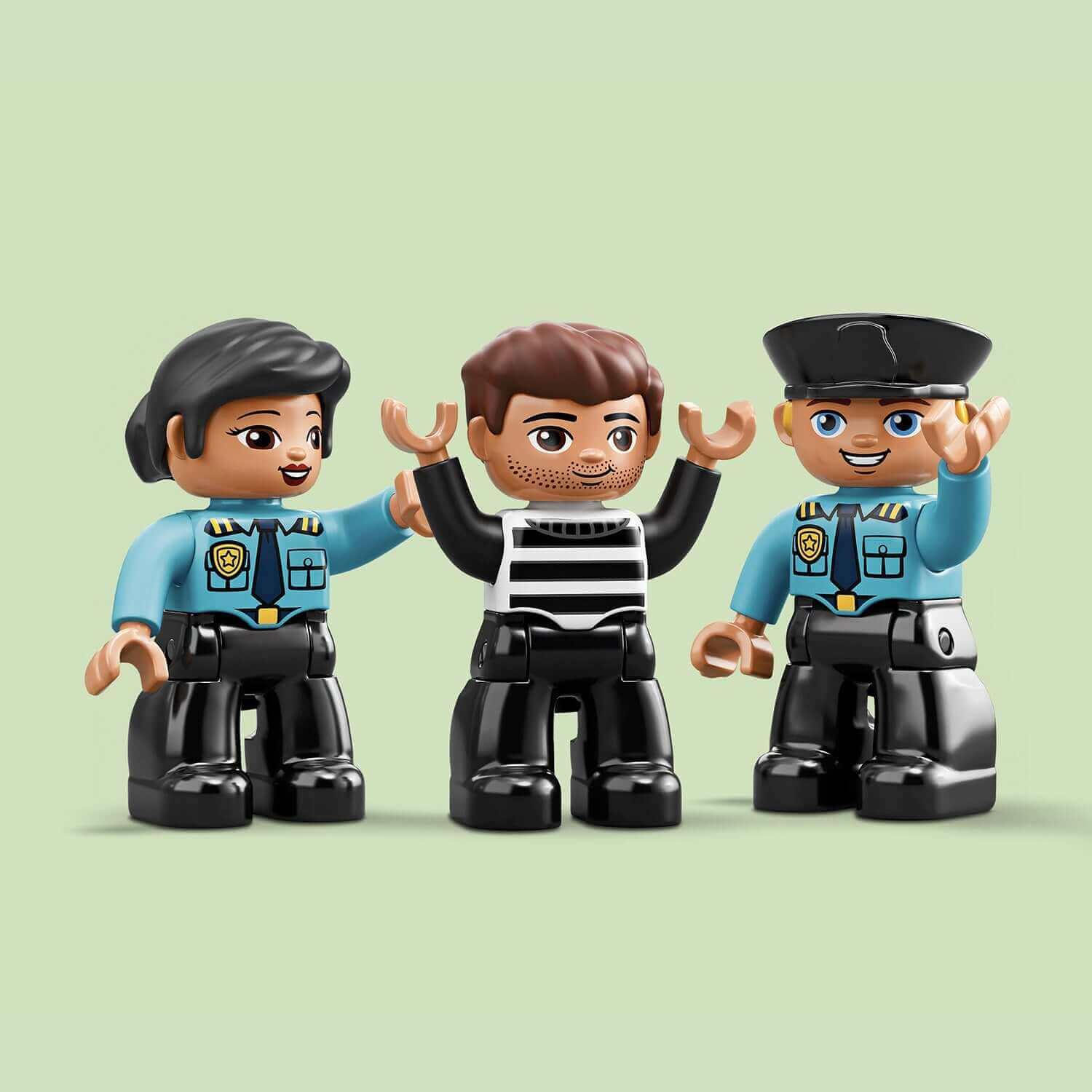 LEGO® DUPLO police figures, including officers and a playful prisoner, promoting imaginative preschool police adventures.