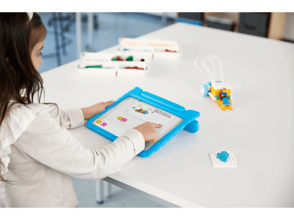 Child using tablet for hands-on STEAM learning with LEGO Education SPIKE Essential Set 45345.