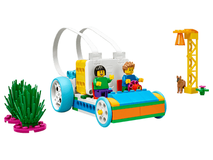 LEGO Education SPIKE Essential Set featuring kids in a colorful vehicle with accessories for hands-on STEAM learning.