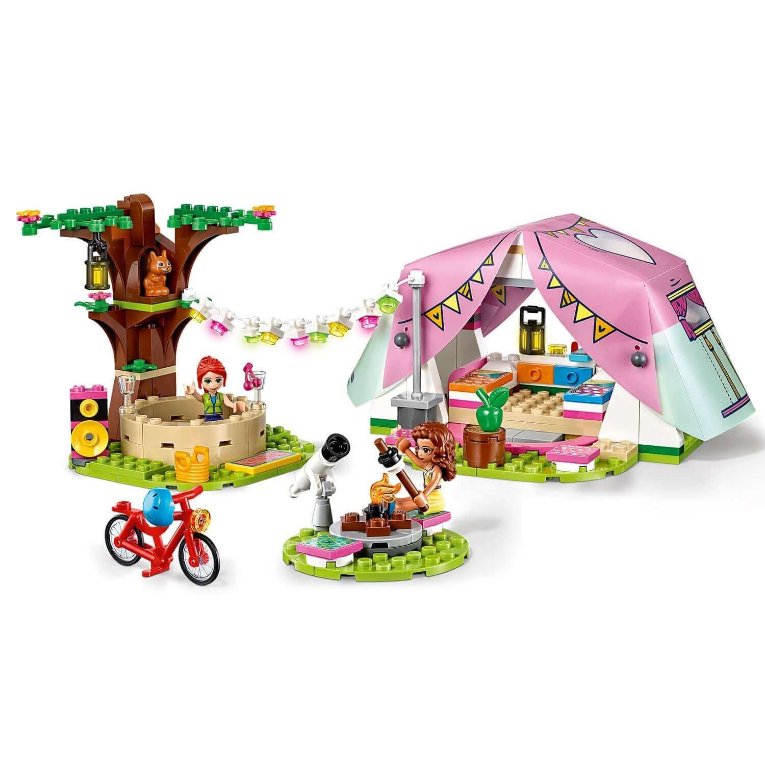 LEGO® Friends Nature Glamping Camping Set 41392 featuring a pink tent, tree, and friends enjoying outdoor adventures.
