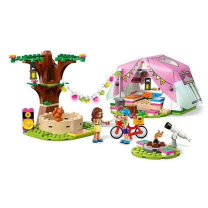 LEGO® Friends Nature Glamping Set 41392 with colorful tent, tree, and outdoor activities for kids.