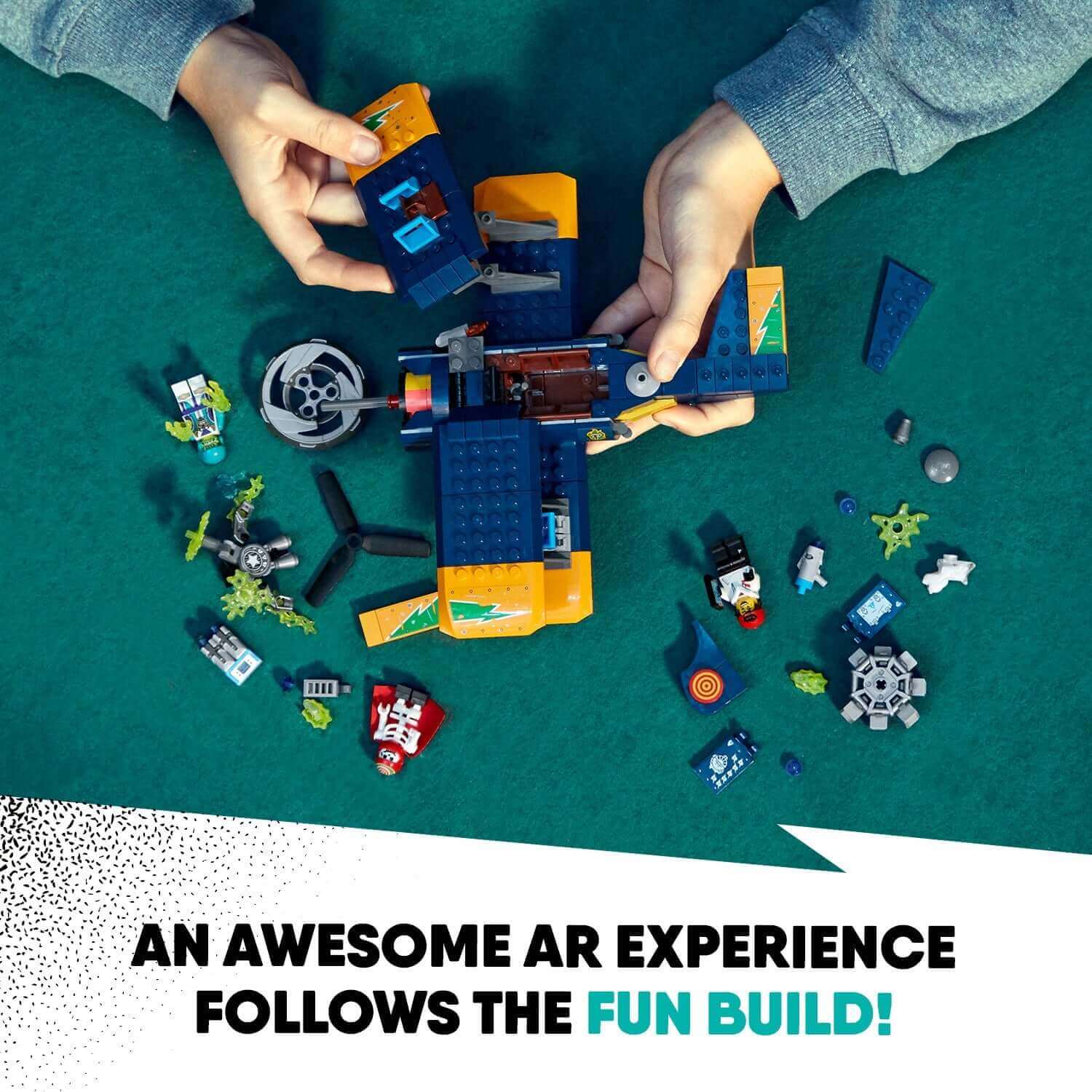 Child building LEGO® Hidden Side El Fuego's Stunt Plane Set 70429, featuring AR play experience and scattered mini-figures.