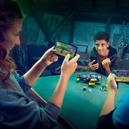 Kids enjoying AR gameplay with LEGO® Hidden Side set, engaging with minifigures and digital elements on smartphones.