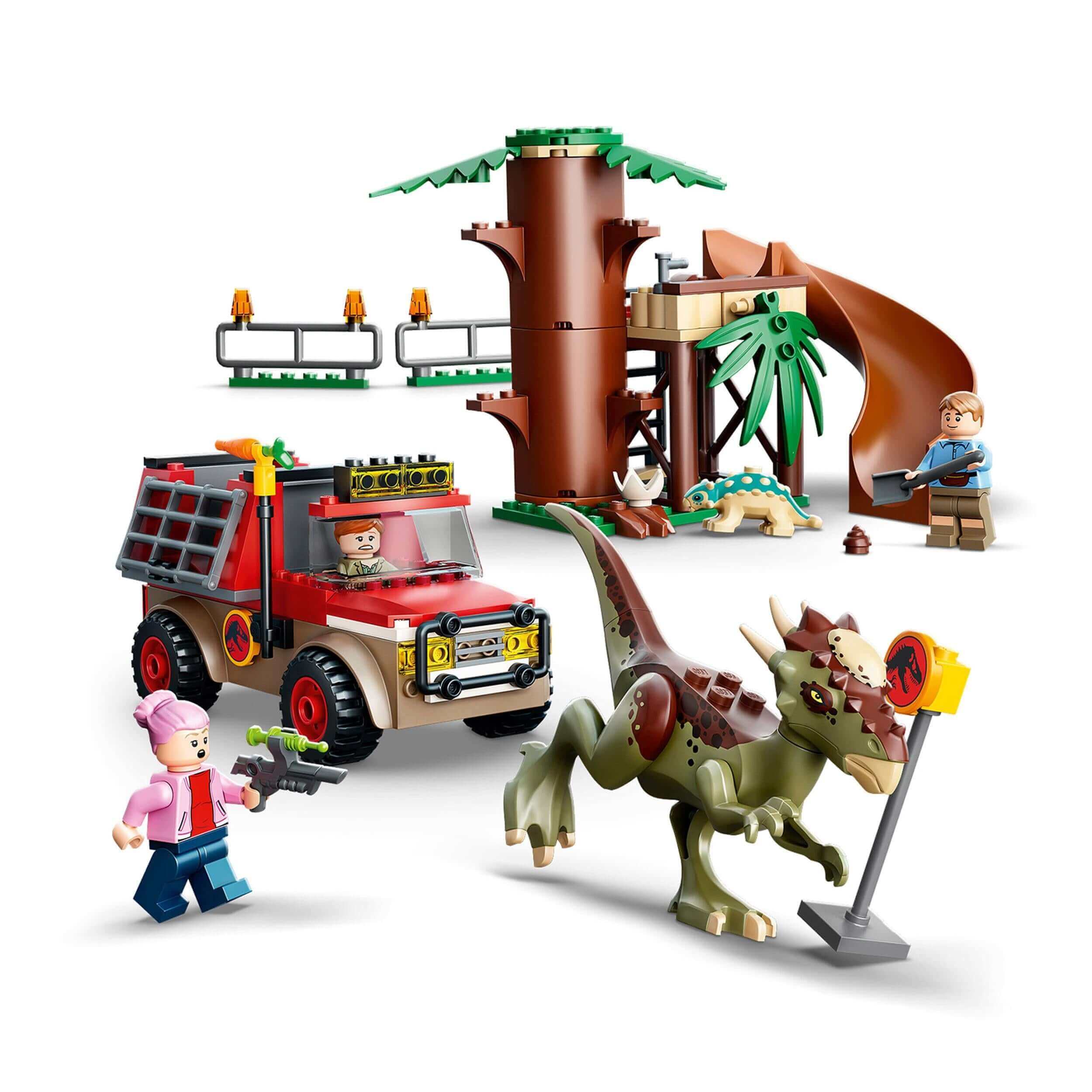 LEGO® Jurassic World Dinosaur Escape Toy 76939 with Stygimoloch, off-roader, tree house, and kids building playset.