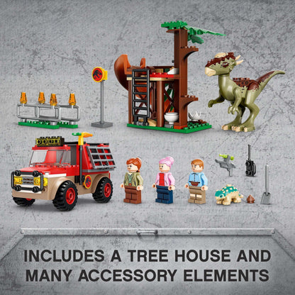 LEGO® Jurassic World Dinosaur Escape Toy set featuring a Stygimoloch, off-roader, tree house, and accessories.