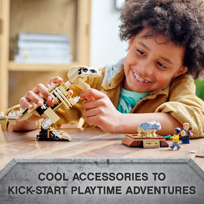 Child engaging with LEGO® Jurassic World T. rex skeleton and Baby Triceratops, showcasing playful learning.