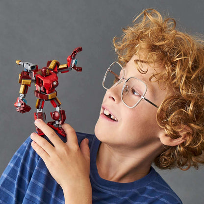 Child amazed by LEGO® Iron Man mech toy, showcasing creativity and playfulness in a vibrant setting.