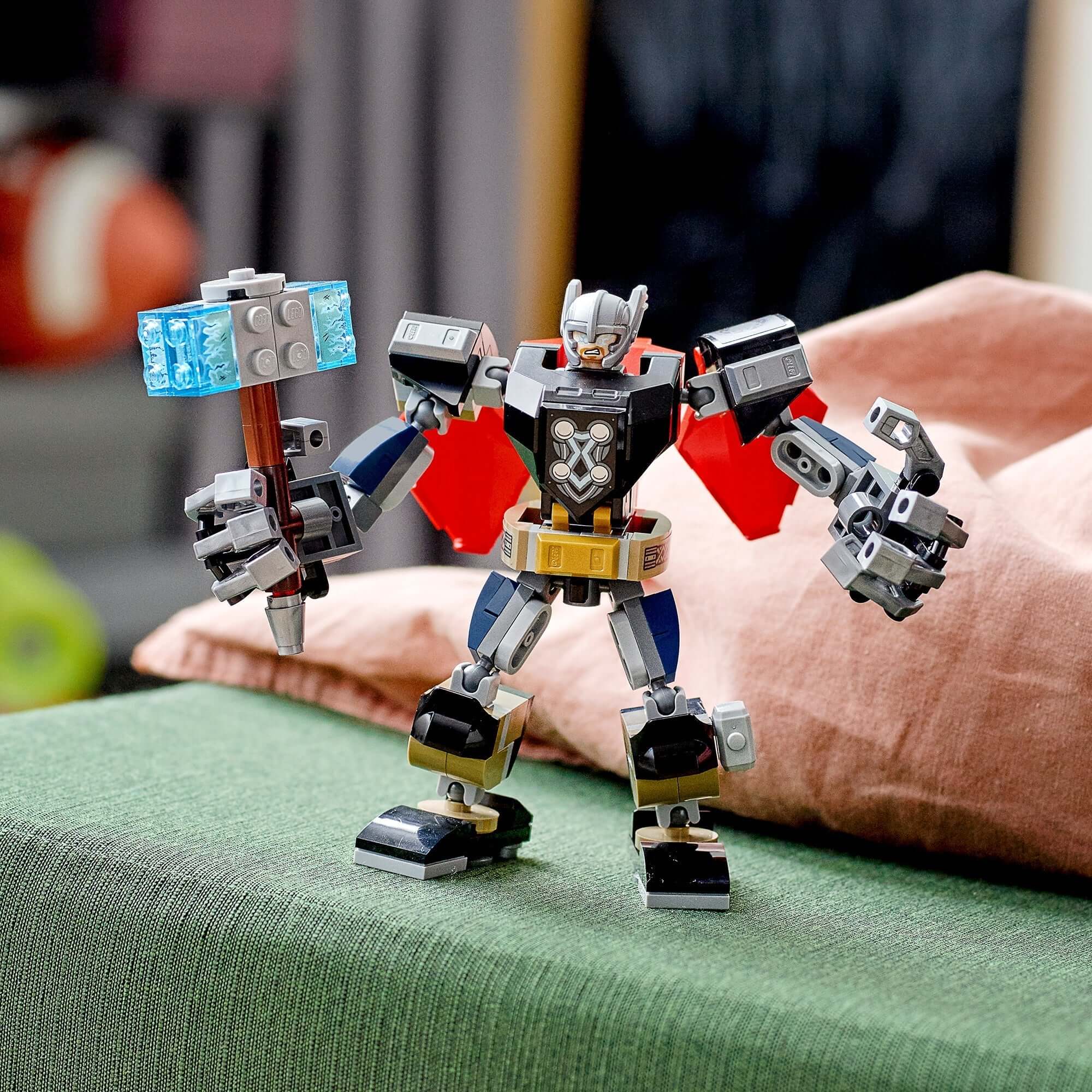 LEGO Marvel Avengers Thor Mech Armour with movable limbs and detachable hammer, featuring Thor minifigure.