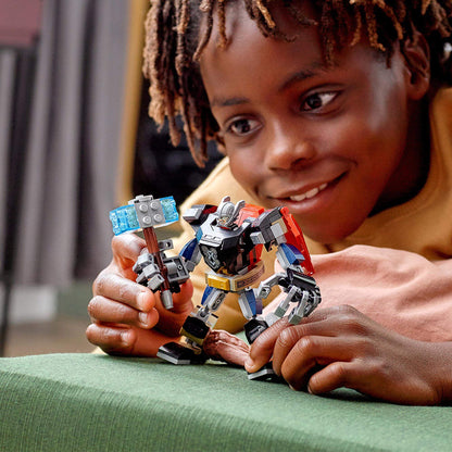 Child joyfully playing with LEGO Marvel Avengers Thor Mech Armour Toy, featuring movable limbs and detachable hammer.