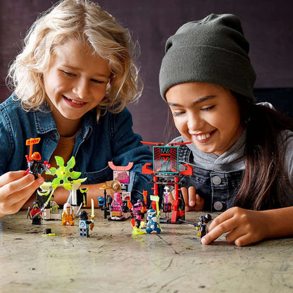 Kids enjoying LEGO® NINJAGO Gamer's Market Minifigures Set 71708, playing with colorful figures and toy market.