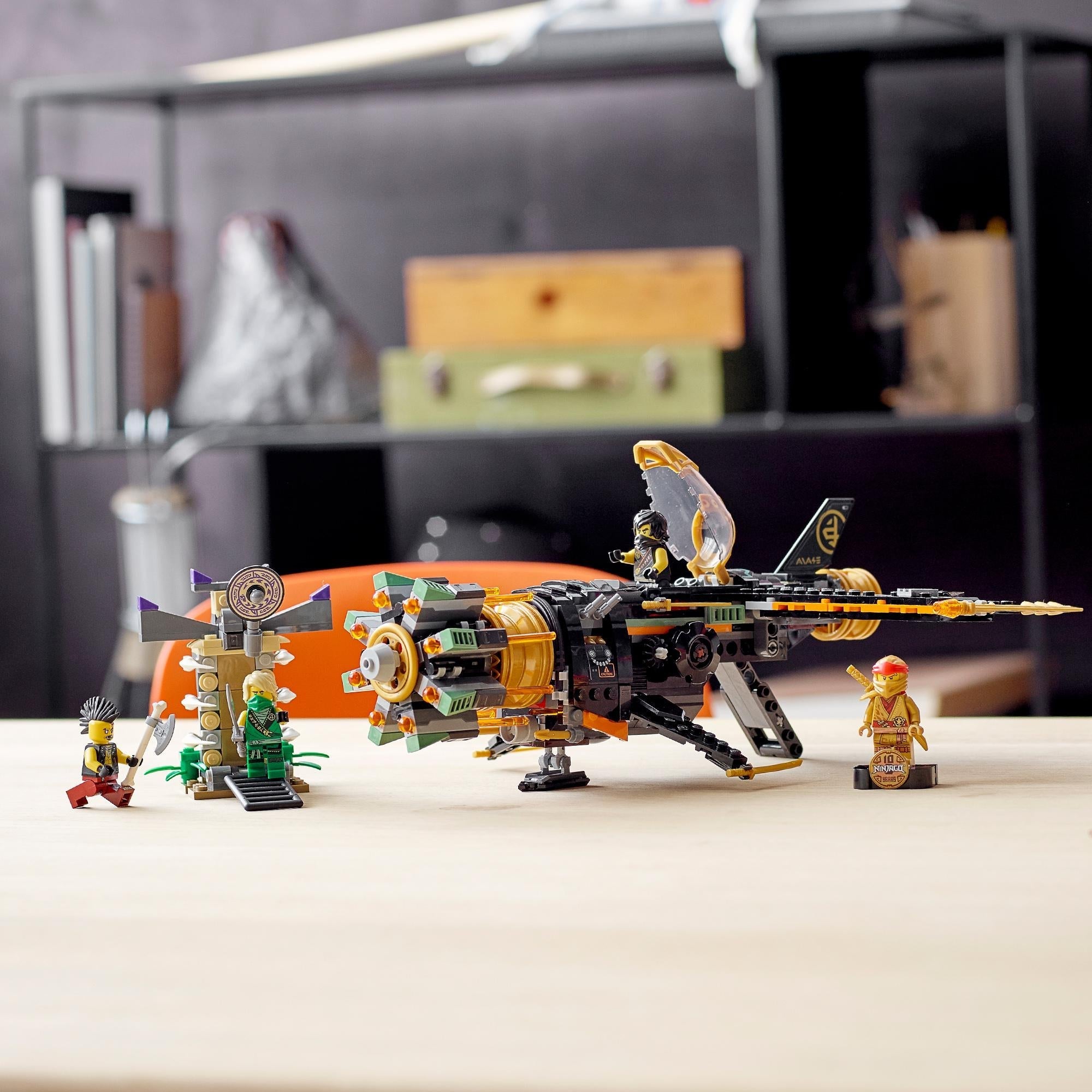 LEGO NINJAGO Legacy Boulder Blaster Set 71736 featuring shooting aeroplane and ninja mini-figures for imaginative play.