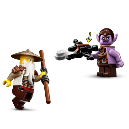 LEGO Ninjago Wu battles Gleck with a staff and weapon in a dynamic scene from the 71718 toy set.