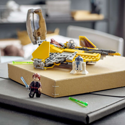 LEGO Star Wars Anakin's Jedi Interceptor 75281 with R2-D2 and Anakin Skywalker minifigure on a table.
