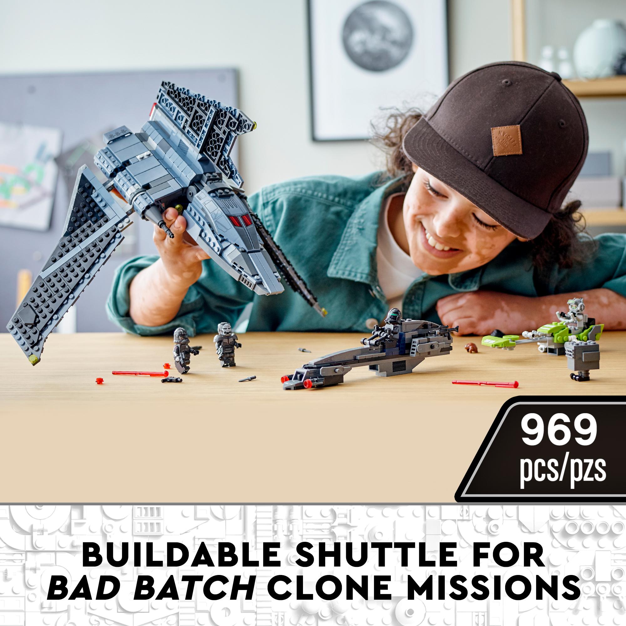 Child playing with LEGO® Star Wars The Bad Batch Attack Shuttle, featuring a buildable shuttle for clone missions.