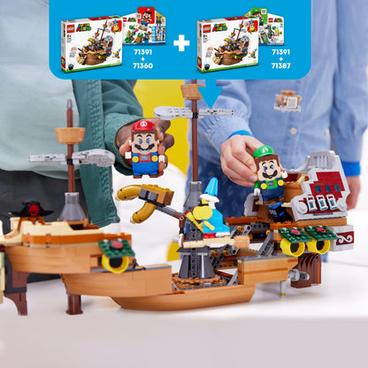 Kids playing with LEGO® Super Mario Bowser Airship Expansion Set 71391, featuring Mario and Luigi characters.