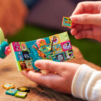Child using LEGO® VIDIYO Folk Fairy BeatBox to create music videos with colorful tiles and character.