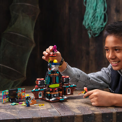 Child enjoying the LEGO® VIDIYO Punk Pirate Ship set, directing a music video with colorful characters and accessories.