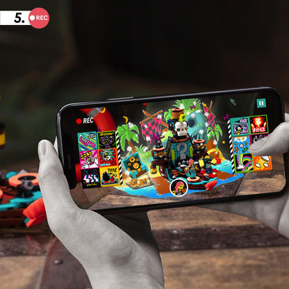 Child recording a music video using the LEGO® VIDIYO Punk Pirate Ship BeatBox set on a smartphone.
