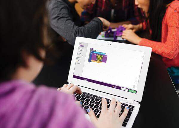Student coding in Google Blockly on a laptop, engaging in computational thinking with littleBits Code Kit.
