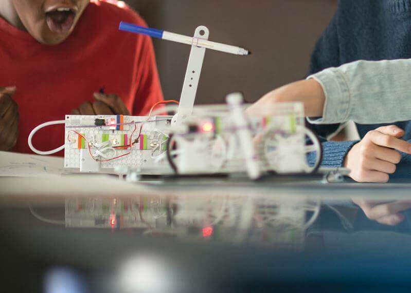 Students engaging with littleBits STEAM+ Coding Kit, building inventions and exploring engineering concepts.