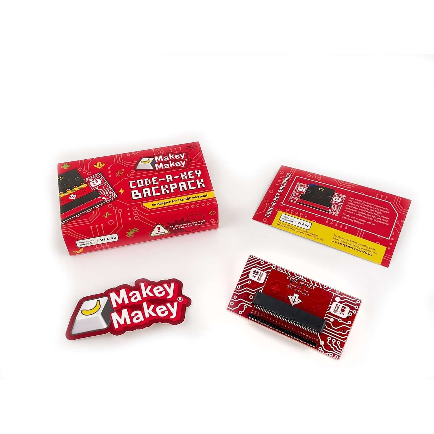 Makey Makey Code-a-Key Backpack kit with packaging, instructional card, and components on a white background.