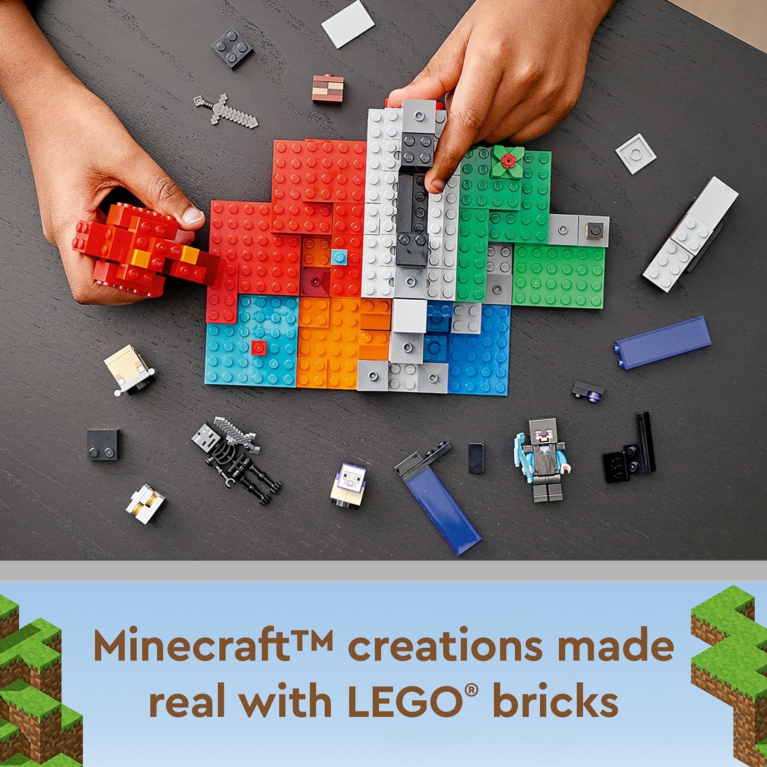 Child hands building Minecraft scenes with colorful LEGO® bricks on a table.