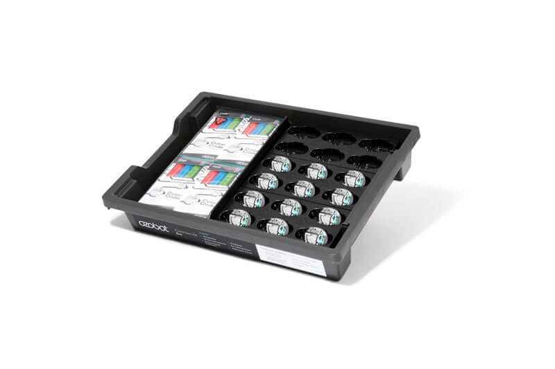 Ozobot Bit+ Bulk pack featuring 12 bots, USB power cables, and coding resources in a tray.