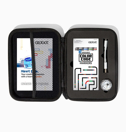 Ozobot Evo Entry Kit open showing markers, coding cards, and accessories for creative coding in classrooms.