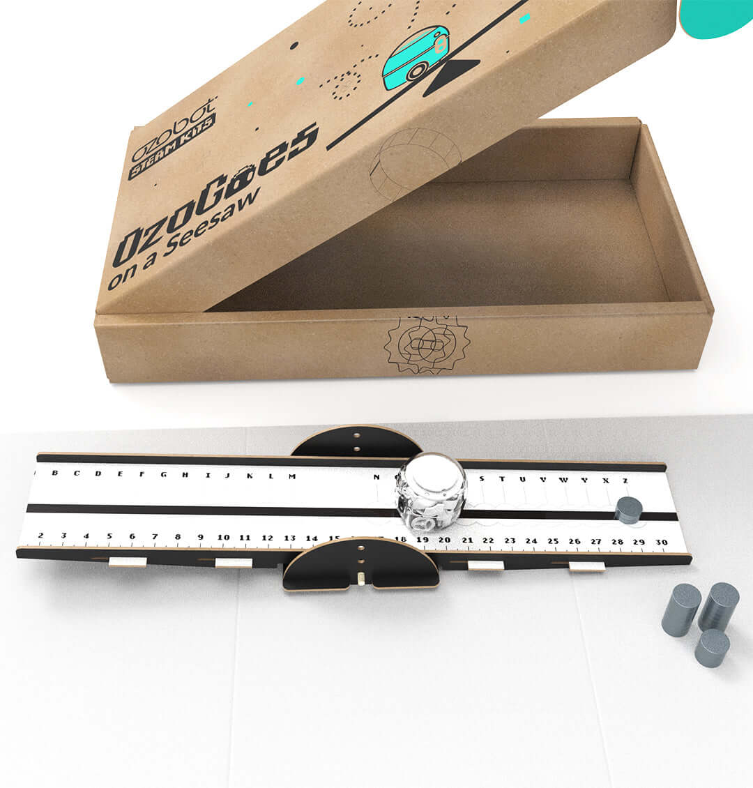 OzoGoes On A Seesaw kit, box and seesaw model for learning STEAM concepts and engineering skills.