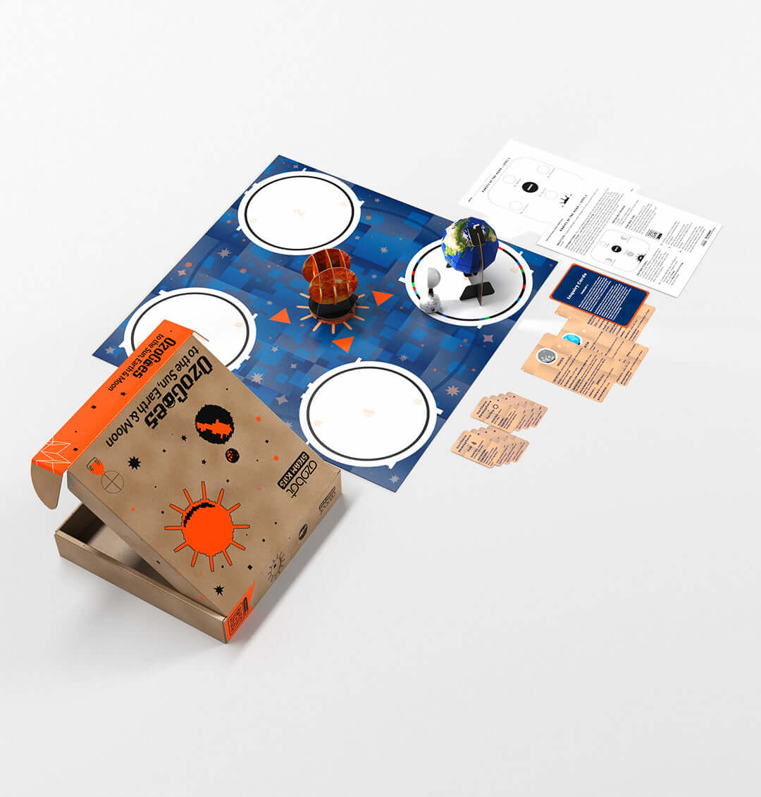 OzoGoes to the Solar System kit with planets, game board, and educational materials for STEAM learning.