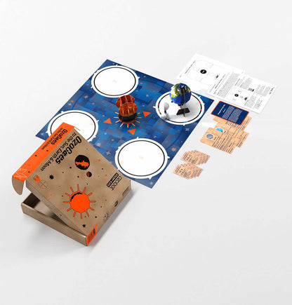OzoGoes to the Solar System kit with planets, game board, and educational materials for STEAM learning.