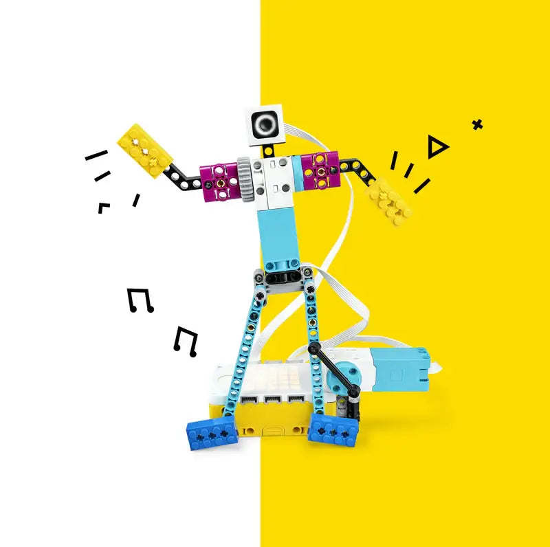 Colorful robot figure made of building blocks, dancing on a vibrant yellow background.