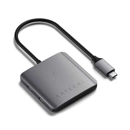 Satechi Aluminum 4-Port USB-C Hub with sleek design and Type-C connection for data transfer.