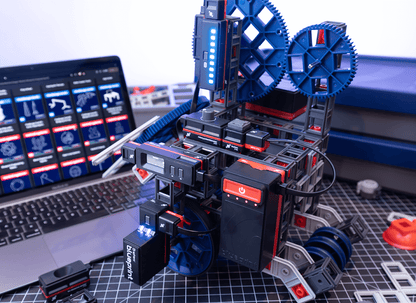 Blueprint Engineering Class Pack showcasing a robotic kit with gears and a laptop displaying engineering resources.