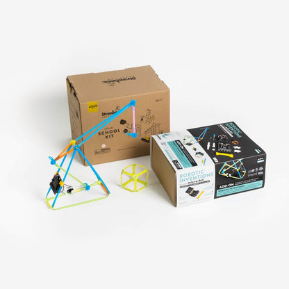STEAM School Kit for micro:bit with robotic inventions box and Strawbees project model on display.