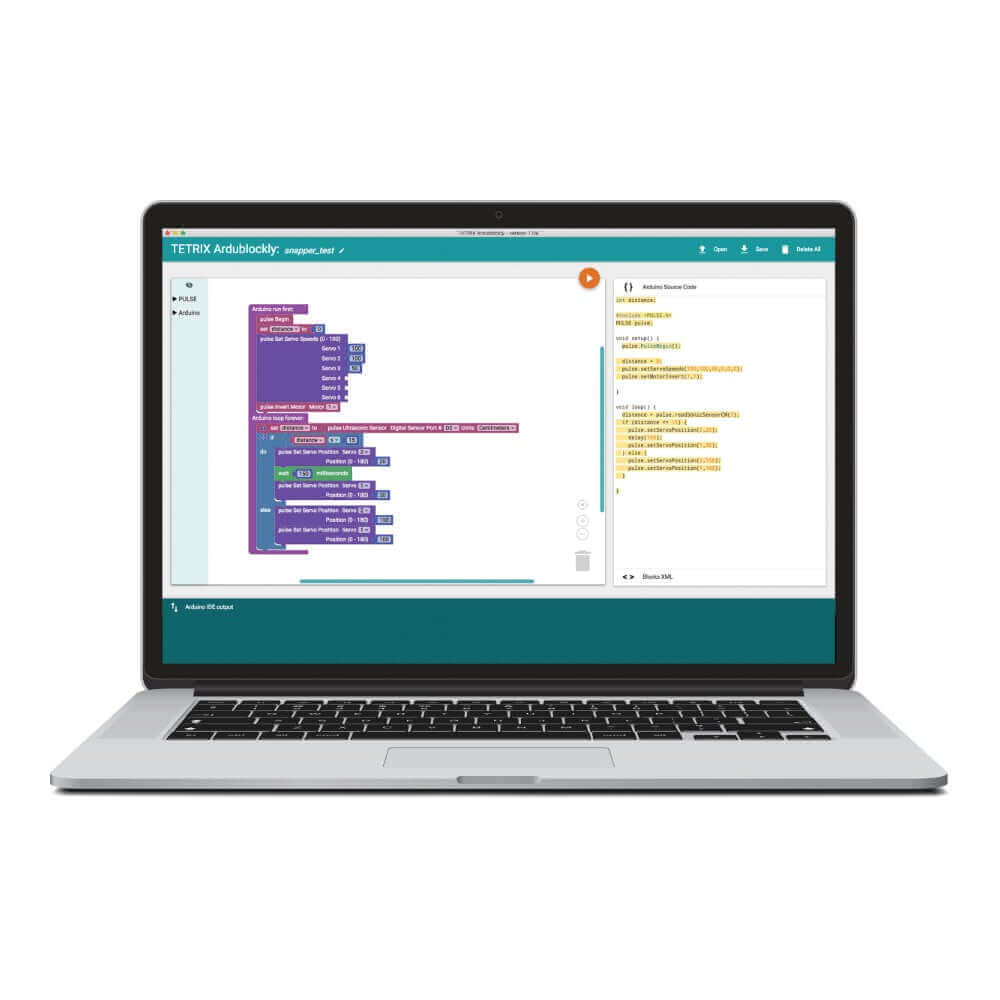 TETRIX PRIME robotics programming interface displayed on a laptop screen with coding blocks.