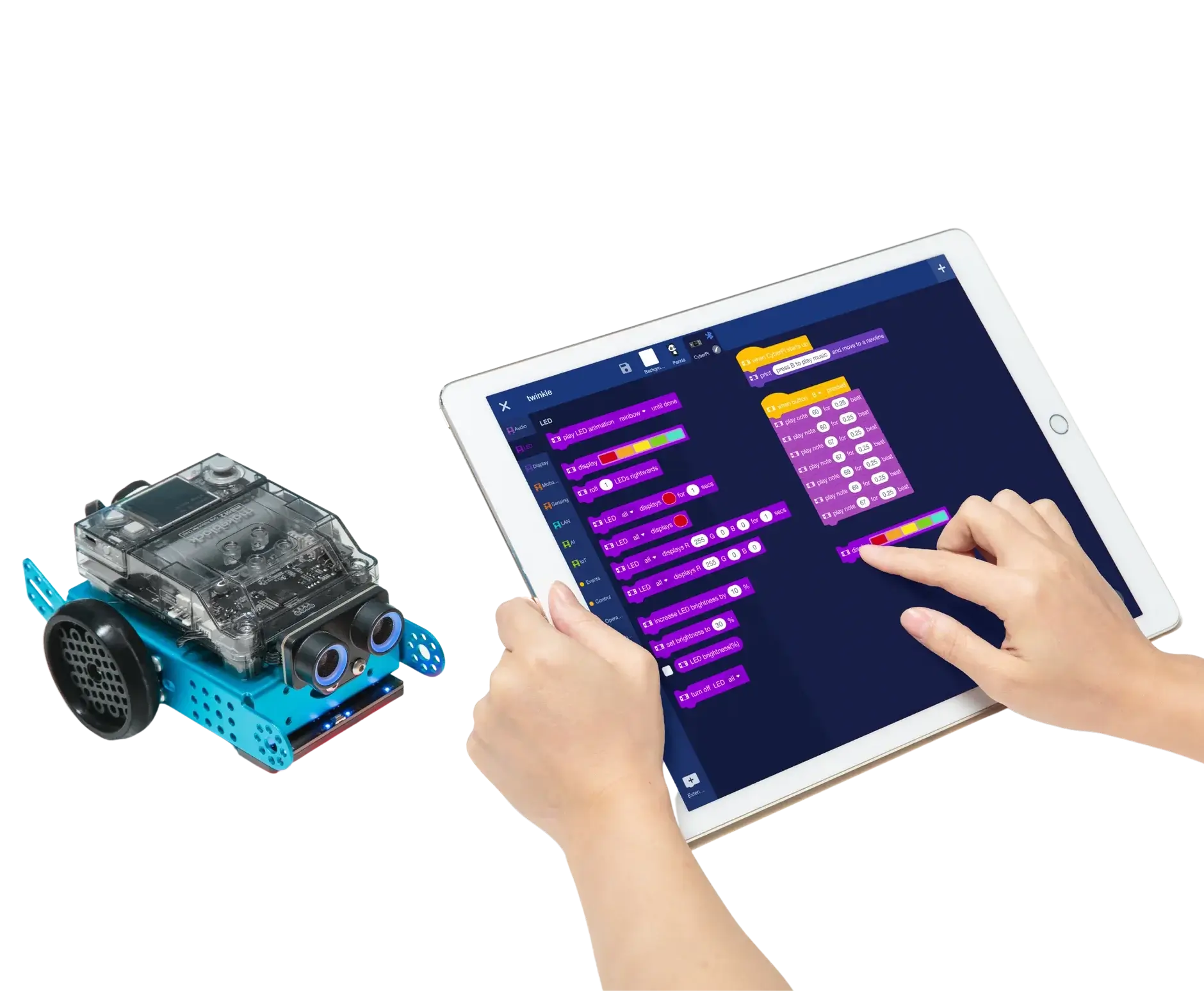 Hands coding a robot using a tablet with colorful programming blocks and a robotic car on the side.